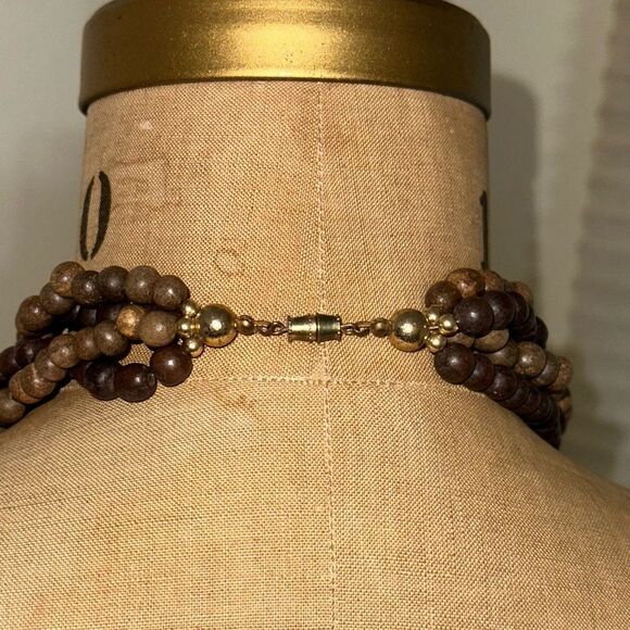 Elegant Brown Wooden Beaded Necklace with Carved Mother of Pearl Leaf Pendant - Picture 4 of 11